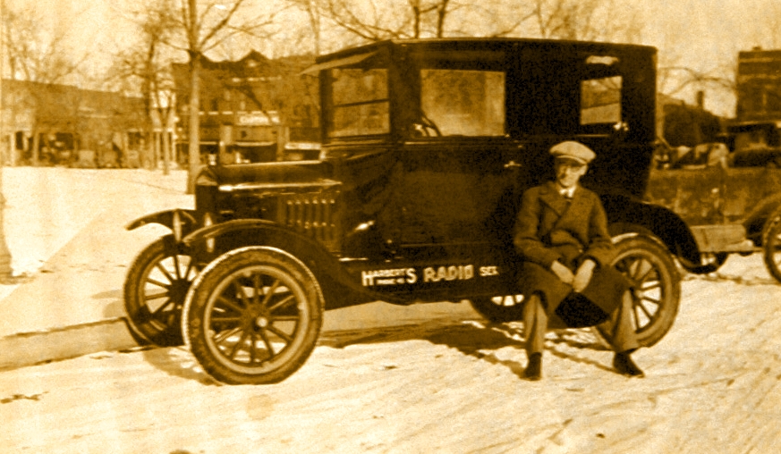  Francis Harbert sitting on running board of 