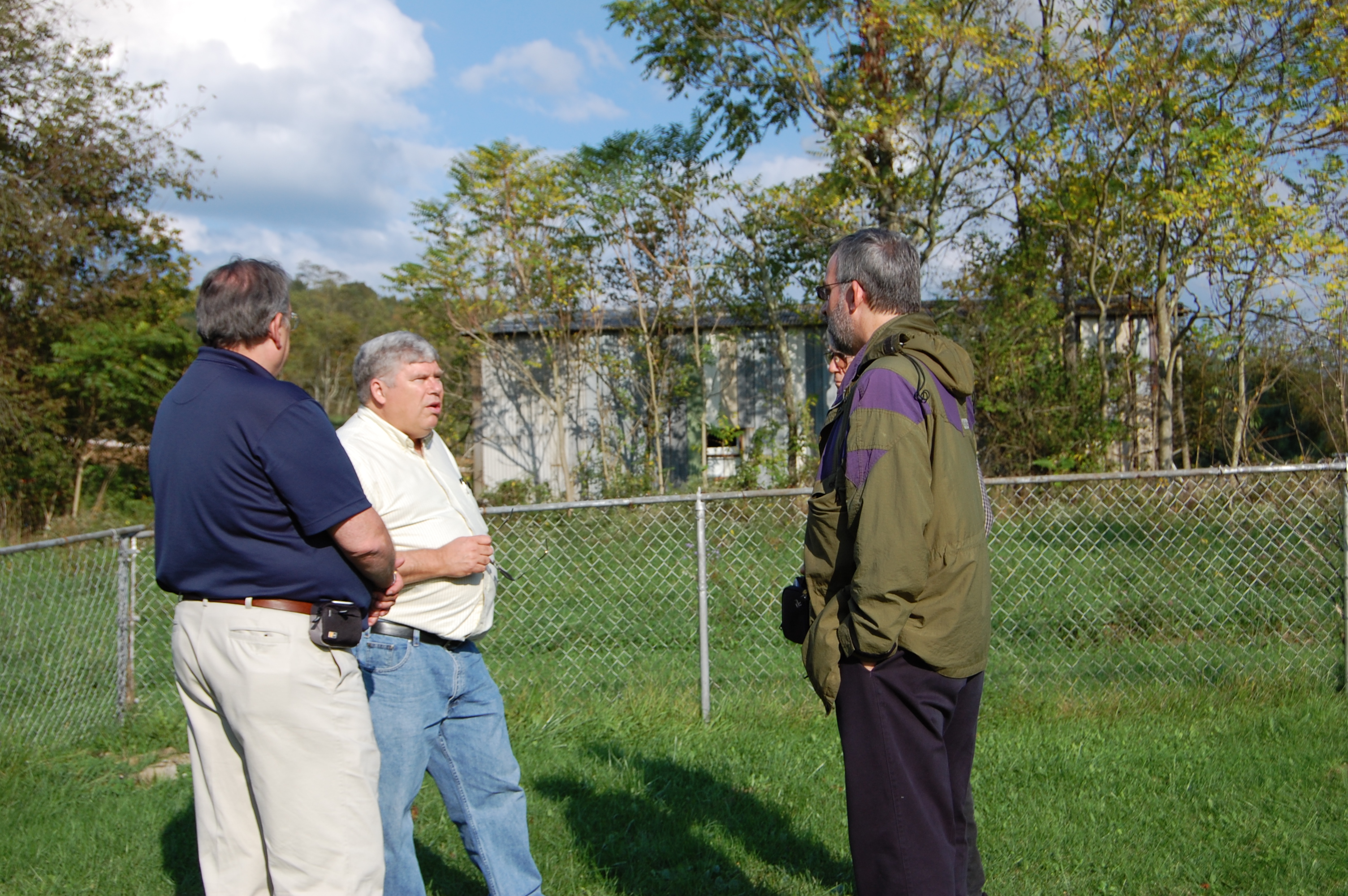  Sep 24, 2011 - Frank, David & Brian Harbert - discussing plans for Thomas' gravemarker and memorial 